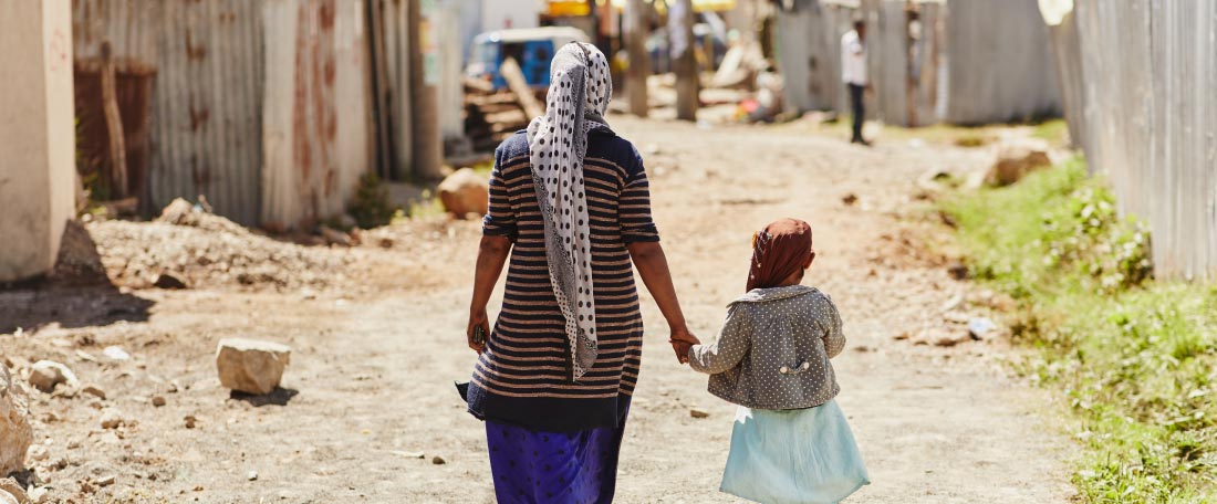 A mother and her daughter walking in Ethiopia