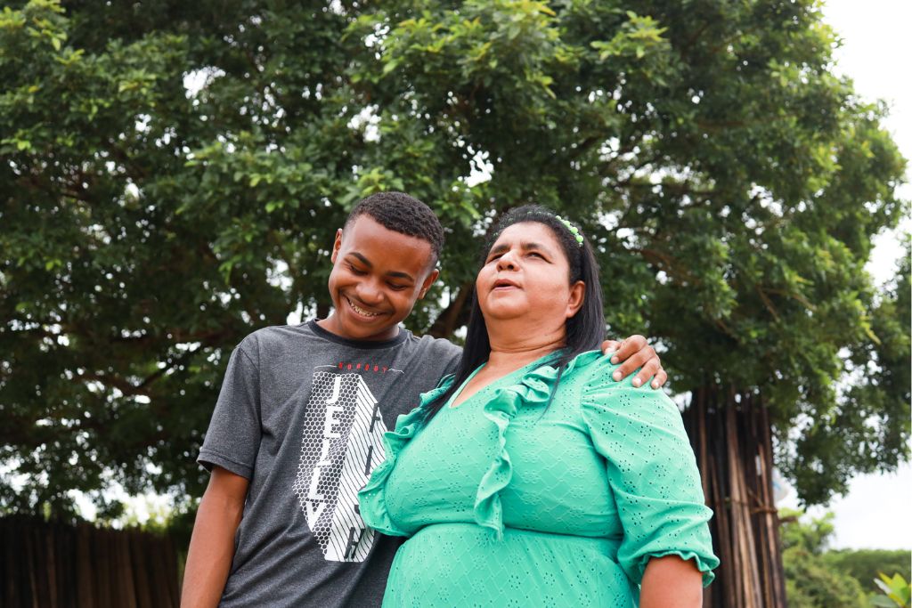 Marcelo standing with mum